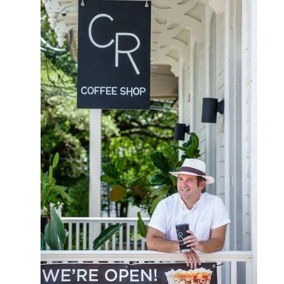 Kevin Pedeaux, founder of CR Coffee Shop, on the Magazine Street porch in New Orleans